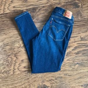 Levi’s 710 super skinny medium wash jeans 29x28